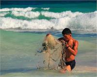 Fisherman With Casting Net In Tulum Mexico